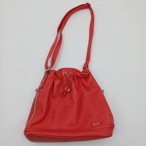 CORAL RELIC PURSE  WITH SNAP MAGNETIC CLOSURE. SHOULDER STRAP IS ADJUSTABLE . 2